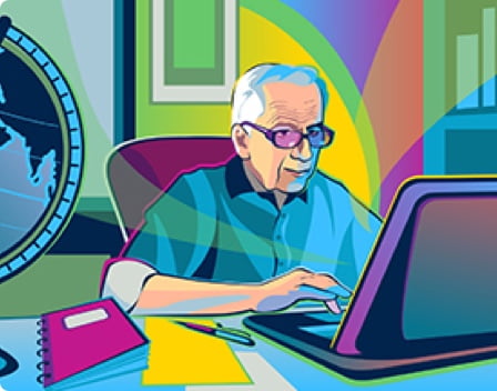 An older man researching about conditions with pulmonary fibrosis on his computer.